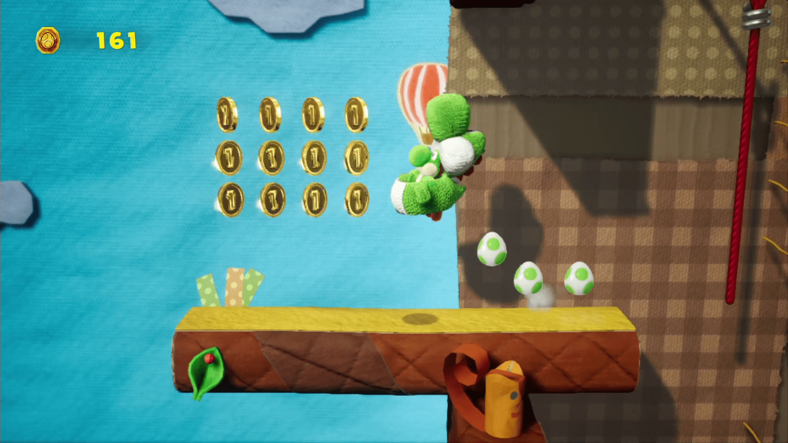 Yoshi Pulls Some Strings Yoshi's Crafted World Walkthrough Neoseeker